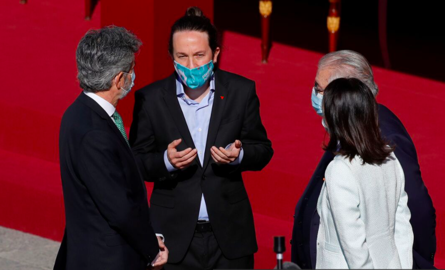 Carlos Lesmes y Pablo Iglesias conversando en el acto del Día de la Hispanidad | Foto: EFE